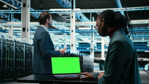 Green screen laptop used by data center software developer using AR simulation Stock Footage 329714381