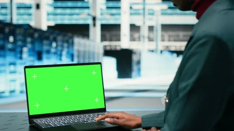 Green screen laptop used by data center software developer using AR simulation 動画素材 329715786