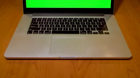 Green Screen Macbook Mock Up On Table-Tilt Video stock 147792388