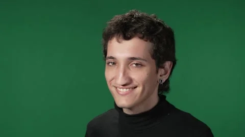 Green screen millennial smiling and bouncing Stock Footage 218061659