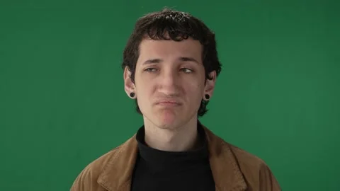 Green screen millennial thinking and approving Stock Footage 218061797