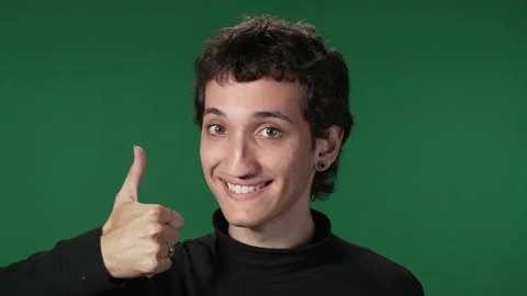 Green screen millennial - thumbs up  2 Stock Footage 218060551