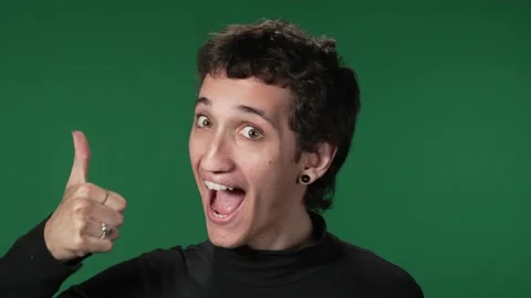 Green screen millennial - thumbs up Stock Footage 218060566