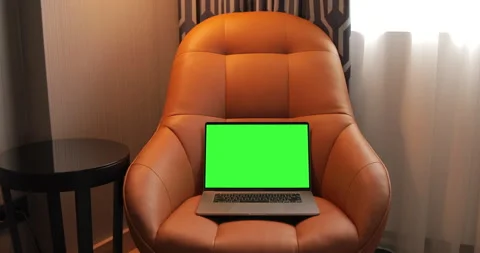 Green Screen Mock-up Laptop Placed on the Armchair at the Luxury Home  Office. Stock Footage 140249230