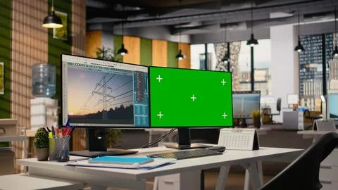 Green screen mockup computer used for smart electric grid development Stock Photos