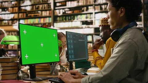 Green screen mockup on desktop computer with tracking markers 写真素材