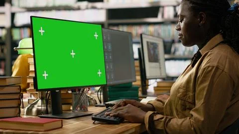 Green screen mockup on desktop computer with tracking markers 写真素材