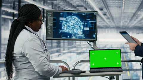 Green screen mockup laptop and AI used by businesspeople in PCB factory Stock Footage 333386871