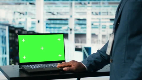 Green screen mockup laptop, network management and engineer in server farm Stock Footage 330205576