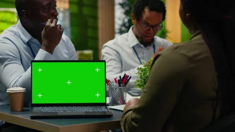 Green screen mockup laptop used by AI company admins Stock Footage 323238563
