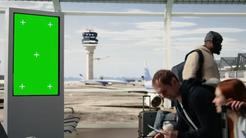 Green screen mockup with man digital nomad in airport terminal Stock Footage 333169937