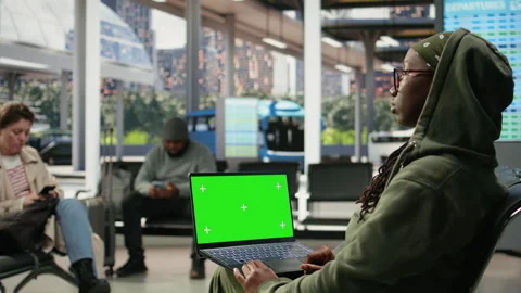 Green screen mockup notebook used by woman working in bus station Stock Footage 341972476