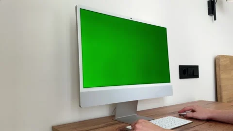 Green screen mockup running on digital workstation display. Operator hand c.. Stock Footage 344050397
