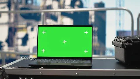 Green screen mockup tablet on drilling rig ship monitoring operations Stock Photos