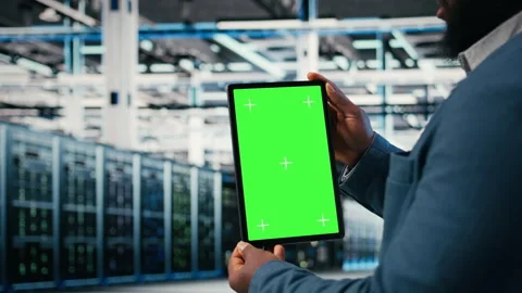 Green screen mockup tablet, hardware and worker in server room Stock Footage 330441607