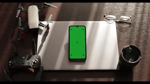 Green screen with motion capture points on the phone. The cellphone of a Stock Footage 278296035