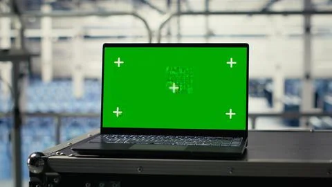 Green screen notebook in data center training infrastructure for AI Stock Photos