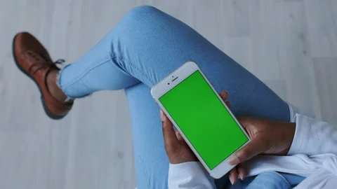 Green Screen or Mock-up Tracking touchpad on smartphone. African American Girl Stock Footage 121099017