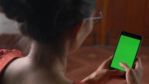 Green screen Over the shoulder shot of young Caucasian female Stock Footage 115669725
