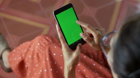 Green screen Over the shoulder shot of young Caucasian female Stock Footage 115675475