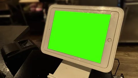 A Green Screen Pay Tablet in a Restaurant 2 Stock Footage 308377907