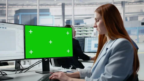 Green screen PC, coding and woman in microchip factory office Stock Footage 335882327
