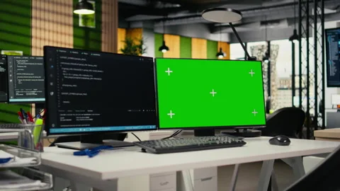 Green screen PC in empty startup office with programming language script Stock Footage 322702723