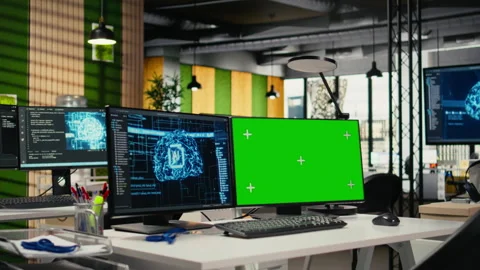 Green screen PC in empty startup office with artificial intelligence program Stock Footage 323143967