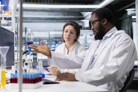Green screen PC software used by lab scientist evaluating genetic markers 写真素材