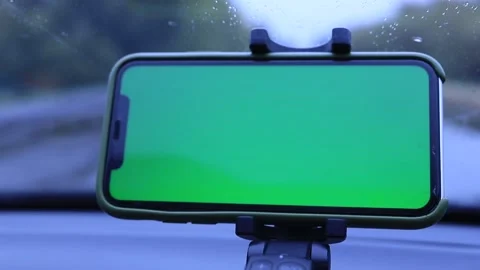 Green screen pcsty iphone swaying from the movement of the car Stock Footage 161753843