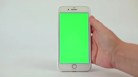 Green screen phone in hand on white background Stock Footage 204621664
