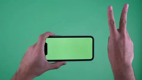 Green screen phone two finger Stock Footage 236375077