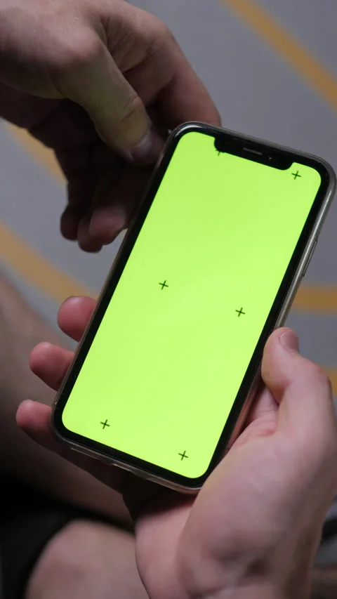 Green screen phone in white man's hands. vertical video Stock Footage 313360360