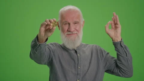 Green Screen. Portrait of an Old Man with BTC Coin Shows Thumb Up. Stock Footage 243464270