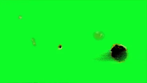 Green screen reveals itself through burning spots on black Stock-Footage 331767912