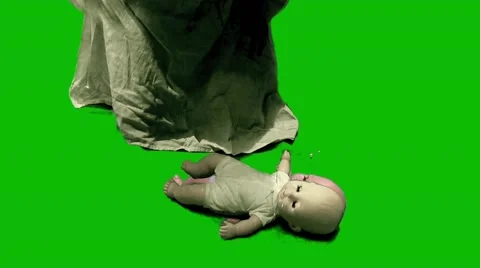 Green screen sequence dead girl stabs doll Stock Footage 59830073