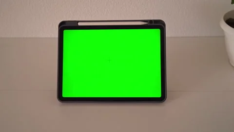 Green screen setup with tablet on a table shows different angles and focus on Stock Footage 339585567