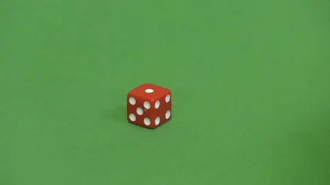Green screen shot of a red dice rolling 1 Stock Footage 117989913
