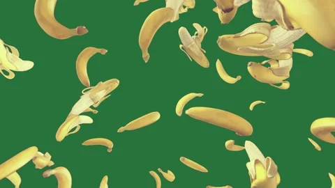 A green screen with small object in the middle and bunch of bananas flying Видео 335122418