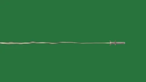 A green screen with small object in the middle and an airplane is flying Stock Footage 335682734