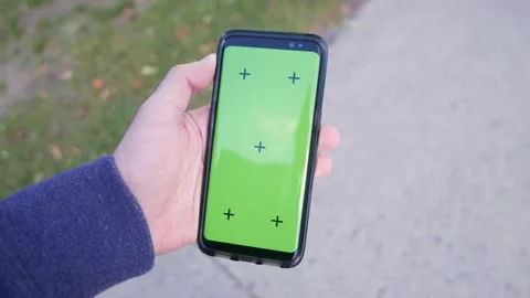 Green Screen Smartphone Being Held In Hand While Walking Video stock 139836746