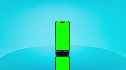 Green Screen Smartphone Reveal on Blue Background Stock Footage 339907553