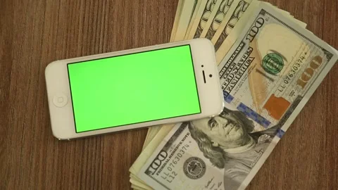 Green Screen Smartphone with US Dollar Bills 動画素材 340903212