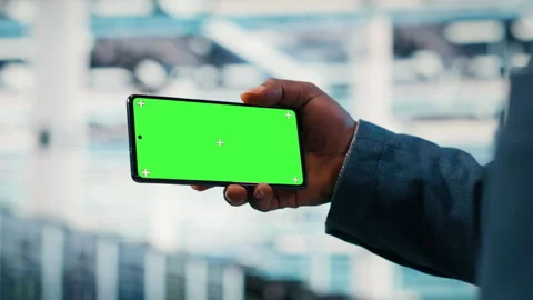 Green screen smartphone used by server farm worker to optimize electronics Video stock 330028770