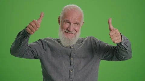 Green Screen. A Smiling Old Man With a Gray Beard Shows Two Thumps Up. Stock Footage 262223627