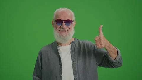 Green Screen. A Smiling Old Man in the Funny Glasses Shows Thumb Up. Stock Footage 263398346