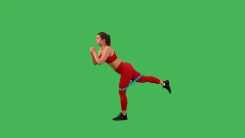 Green screen sportswoman do workout with stretch band Stock Footage 229700220