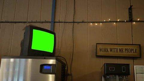 A green screen standard definition TV in a diner for generic use Stock Footage 81111108