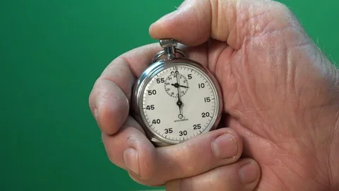 Green screen Stopwatch in hand starting and stopping Stock Footage 97747886