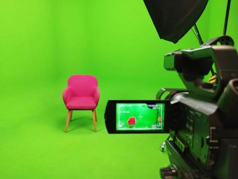 A green screen studio with complete equipment, With a red chair. Stock Photos